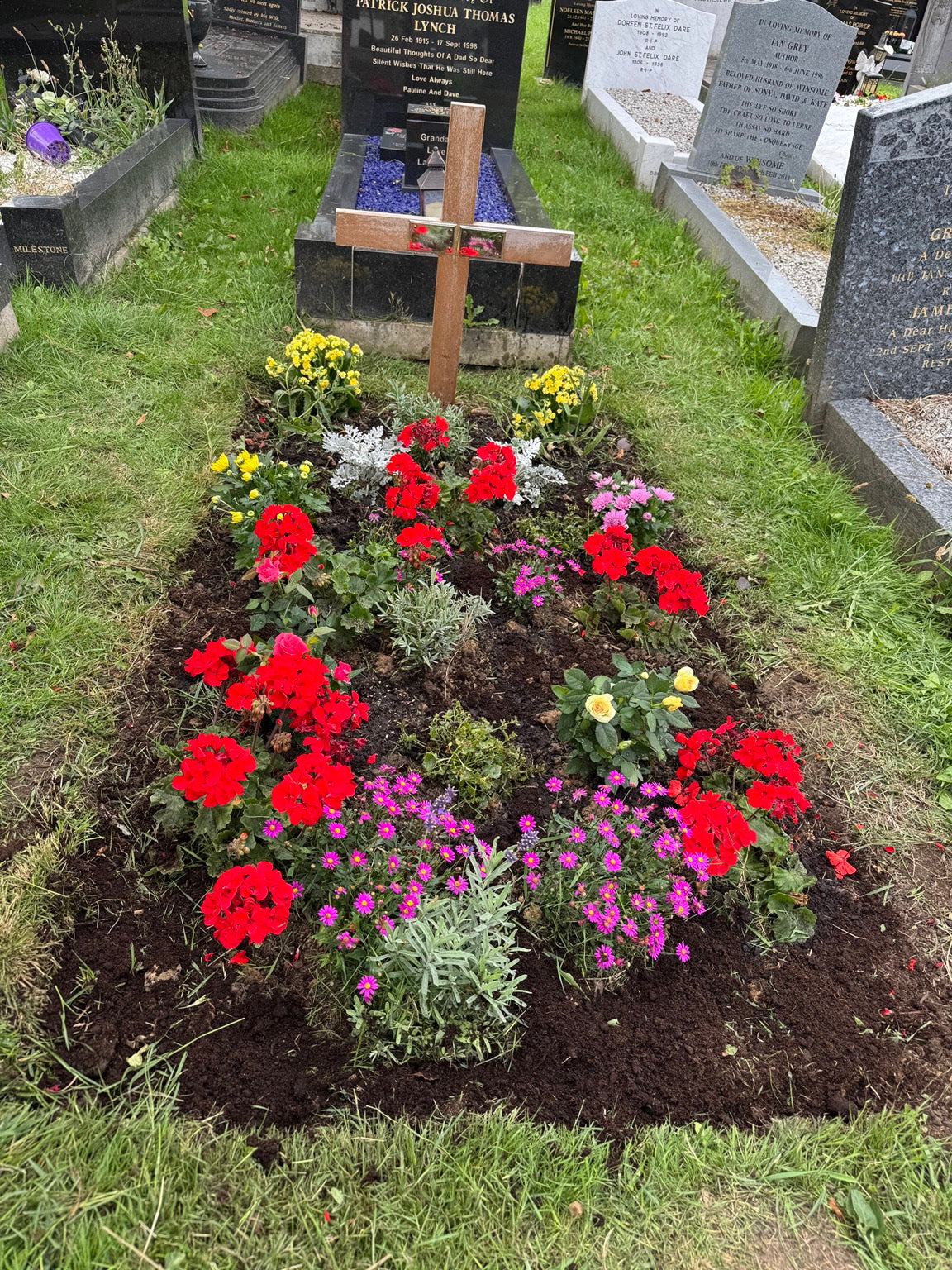 Seasonal grave planting by Never Forgotten